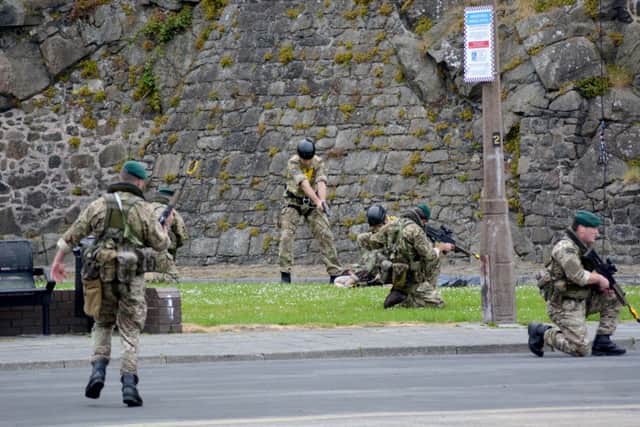 Royal Marine Reserves taking part in a simulated terrorist attack in Carrickfergus. INCT 25-059-GR