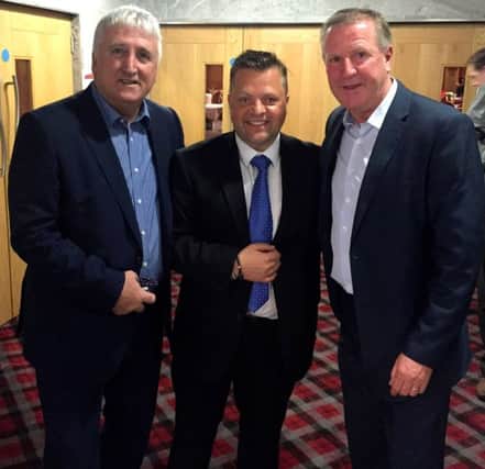Event organiser Keith Norris (centre) with former Liverpool players David Johnson (left) and Ronnie Whelan. INCT 25-707-CON