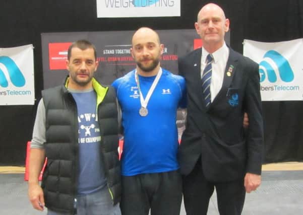 GoLift's Peter Stewart (centre) is pictured with Ray Williams, the Welsh National Coach (left) and Chris Baker (right) who is an international referee.  INLT 26-950-CON