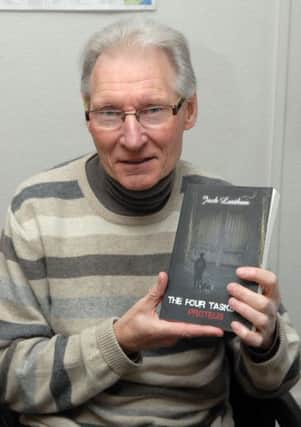 Jack Leathem with his latest book, The Four Tasks of Proteus. INLM1212-103gc