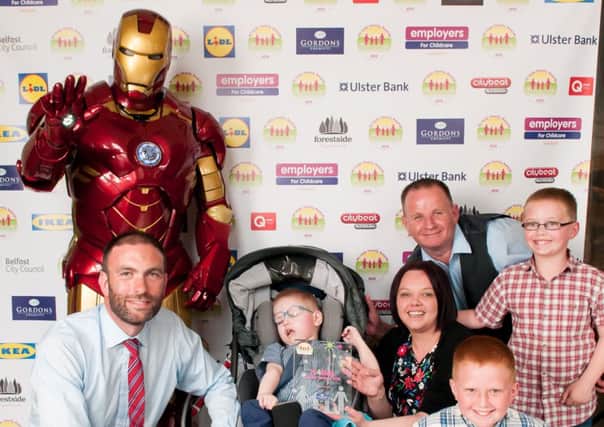The Hawkins family are pictured at the event with Ironman and Ryan Gordon. Gordons Chemists sponsored the event, and Ben presented Ben with a £50 Gordons voucher.