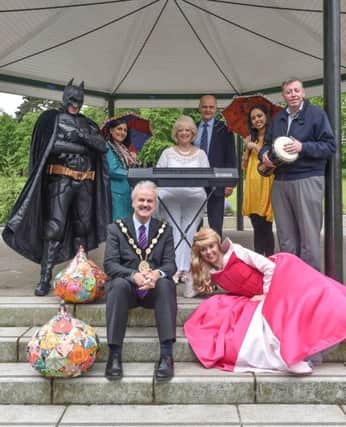 Pictured at the launch of the Park Life programme of events that will be taking place in Wallace Park, Lisburn this summer are:  the Mayor, Councillor Thomas Beckett; Alderman Paul Porter, Chairman of the Council's Leisure & Community Development Committee; Batman, Michael McCabe; Nisha Tanden, Artseckta Mini Mela; Valerie Kirkpatrick (aka Velvet); Jim Rose, Director of Leisure & Community Services; Kaulini Chillara and Sleeping Beauty, Sarah Brown.