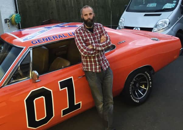 Mike Barr of Star Car Hire pictured with his 'General Lee' replica.  INLT 25-676-CON