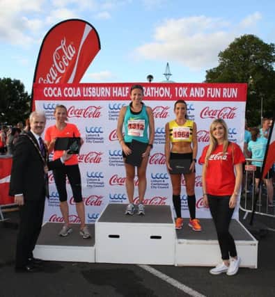 The Mayor of Lisburn & Castlereagh City Council, Councillor Thomas Beckett presented the prizes to the winning female Half Marathoners: Caitriona Jennings (first); Cathy McCourt (second) and Laura Graham (third). Also pictured is Sarah Smith from event sponsor Coca-Cola HBC Northern Ireland.