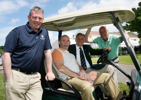 Galgorm Castle Golf Club captain Keith Dinsmore is pictured with Williard Simpson, Tim D'arcy and Alastair McKerville prior to starting their round at Captains Day. INBT26-235AC