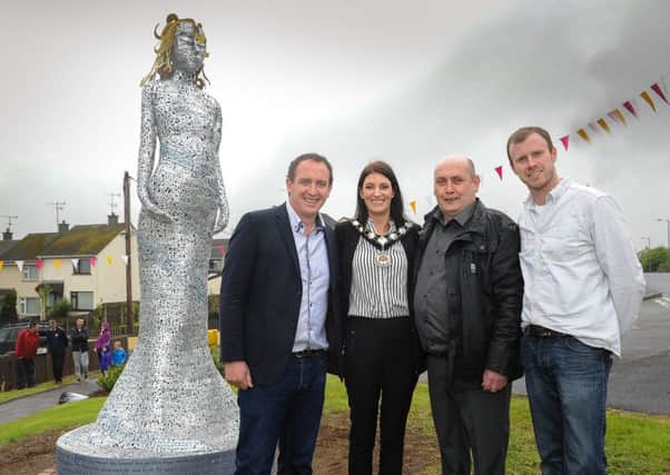 Councillor Cathal Mallaghan, Mid Ulster District Council; Chair of Mid Ulster District Council, Councillor Linda Dillon; Chair of Parkview Residents Group, Declan Coyle; and Artist, Kevin Killen.