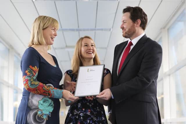 Ulster University EDGE Excel Student of the Year winner Rebekah Decon is congratulated by award sponsor Roland Shaw, Head of Citi Legal, Belfast and Ulster University Employability Development Manager Dr Sharon Milner. Picture John Murphy Aurora PA
