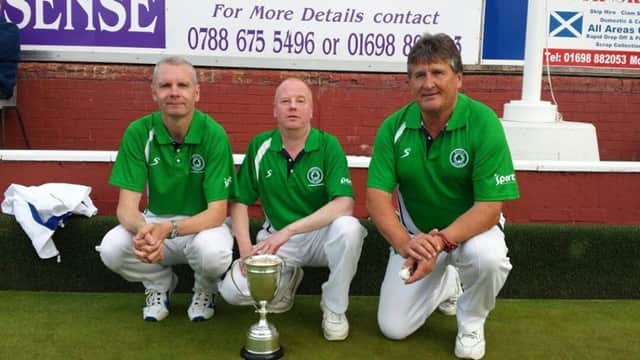 Left to right: Andy Hughes, Michael Higgins and Tony Bell with their British Isles trophy, the first in Dunbarton Bowling Club's history.