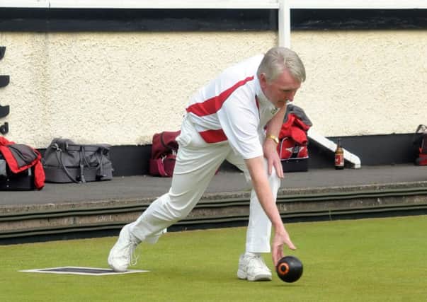 Larne Bowling Club skip, Michael Murphy, delivers his bowl. INLT 26-232-AM