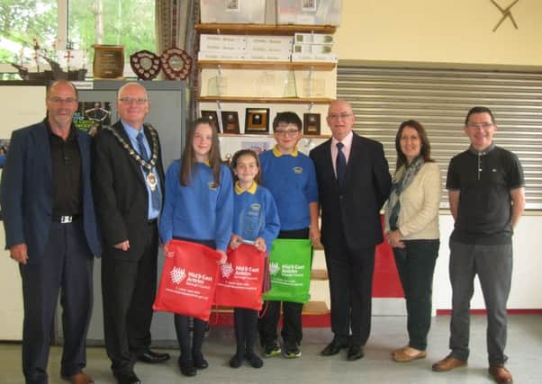 Mayor, Cllr Billy Ashe is pictured with Katie McToal, Daniel Montgomery and Ciara McCormick of Glenravel Primary following the school's winning the  STEM Innovators award. Included is  Principal Mr Bonar, Mayor Billy Ashe, Ciara McCormick, Katie McToal, Daniel Montgomery, Cllr. Paul Maguire, Mrs O'Loan, Mr Magee. (Submitted Picture).