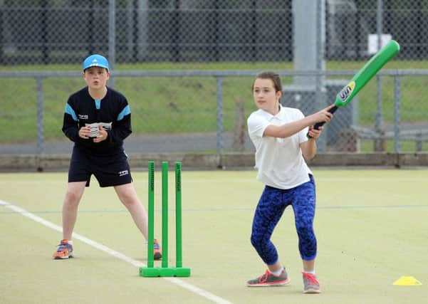 Broughshane PS pupil Katie McIlvenna hits the ball for six during the recent Active Communities Ballymena Primary Schools Quick Cricket tournament. INBT27-210AC
