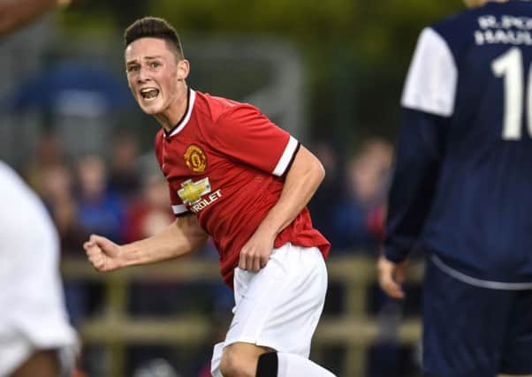 Man Utd's Jordan Andrew Thompson celebrates after scoring against County Armagh, during last year's Milk Cup competition.