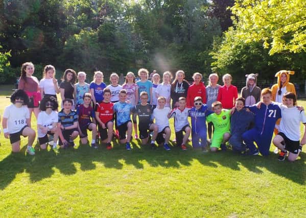 Larne Grammar School pupils pictured at Carnfunnock Country Park during their fancy dress fun run in aid of the RNLI. INLT-26-712-con