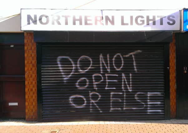 Graffiti on the shutter of the Northern Lights at Dunluce Street (archive picture). INLT 28-639-CON