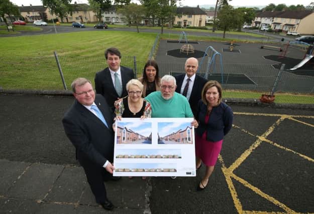 Pictured with the plans of the proposed housing scheme on the former Dunmurry High School site are: (l-r) Jonathan Craig MLA; Ian Snowden, Deputy Permanent Secretary of the Department for Social Development; Councillor Margaret Tolerton, Chair of the Seymour Hill Conway Community Plan Steering Group; Nadine Ritchie, Connswater Homes; Billy Smith, Semymour Hill & Conway Residents Group; Jim Rose, Director of Leisure and Community Services and Dr Theresa Donaldson, Chief Executive, Lisburn & Castlereagh City Council.
