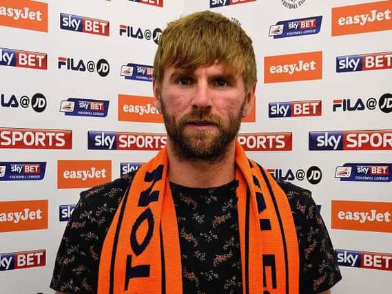 Former Derry City and Celtic star, Paddy McCourt has signed a two year deal with Luton Town.
