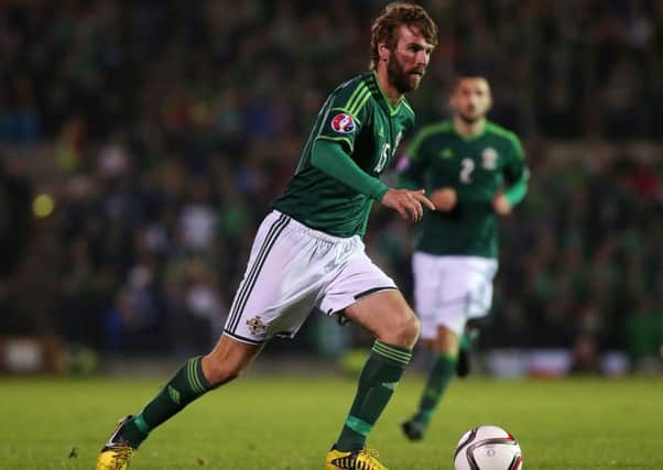 Northern Ireland's Paddy McCourt has signed a two year deal with Luton Town.