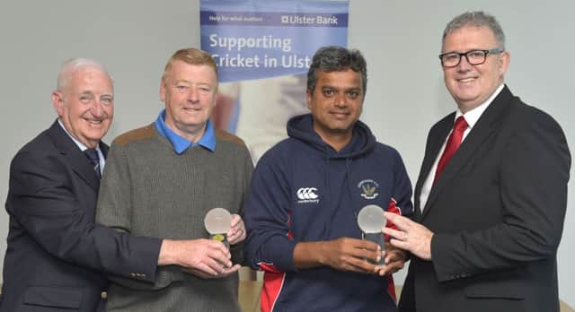 Derriaghy President Graham Kenny (second left) and Club Professional Kaushik Aphale receive Ulster Bank League Awards which go to players who score a century, take at least six wickets or perform a hat-trick in the four sections of the Ulster Bank NCU Senior League. Kaushik won his award for his 101 against Lurgan in May and Graham collected an award on behalf of Craig Lewis who scored 123 not out against Downpatrick. The awards were presented by Billy Boyd, President of the NCU (left), and Stephen Cruise of Ulster Bank. Pic by Rowland White/PressEye