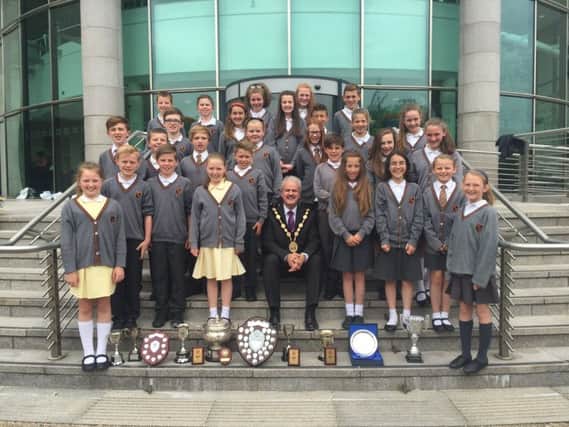 The Mayor of Lisburn & Castlereagh City Council, Councillor Thomas Beckett celebrated the success of pupils from Harmony Hill Primary School recently.