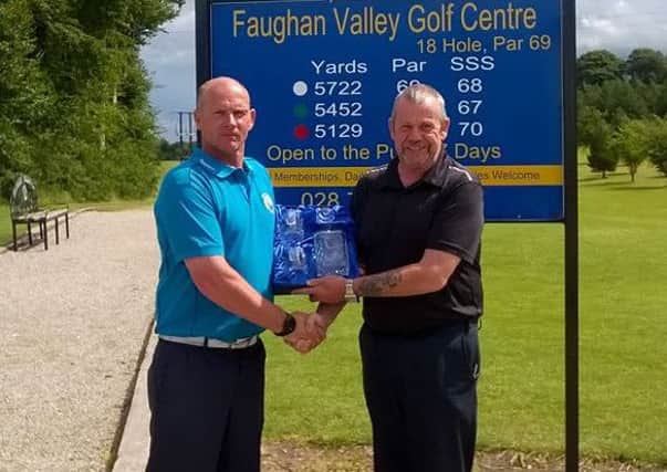 Terry Dornan (left) presented with his President's Day prize from Faughan Valley President John Huw Cleghorn.