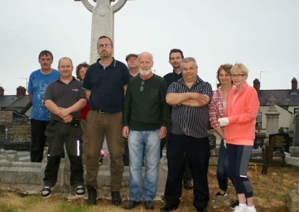 Just some of the many volunteers who have been helping restore the Dougher Cemetery