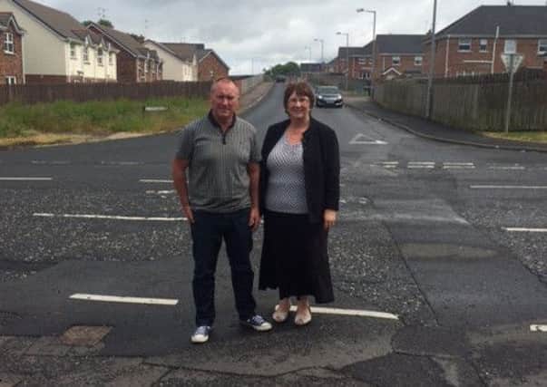 SDLP councillor Declan McAlinden and Upper Bann MLA Dolores Kelly at the Meadowbrook junction