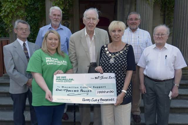 Banbridge Rotary Club President Jenny Ervine presented a cheque for £1000.00 proceeds of the Golf Shoot Out held at Banbridge Golf Club to Emma Ewings Macmillan Cancer Support, included are Rotarians George McCaigue, Dennis Livingstone, David Elliott, Robin Mowbray and Eddie Carr ©Paul Byrne Photography INBL1527-209PB
