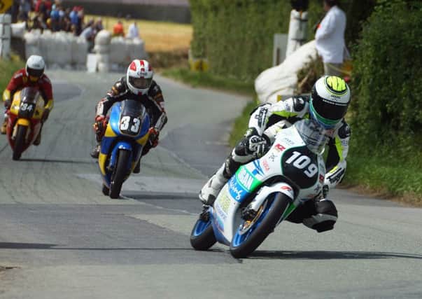 Ballymena man Neil Kernohan stays ahead of Sam Dunlop and Sean Leonard in the 125 race. Picture: Roy Adams.