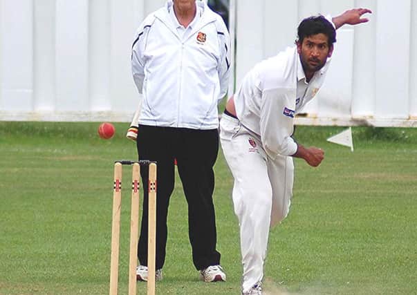 Lurgan bowler Zaheer Ali made an early breakthrough at Woodvale.