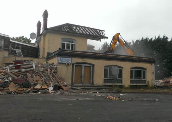 The Carngrove Hotel being demolished on Monday.