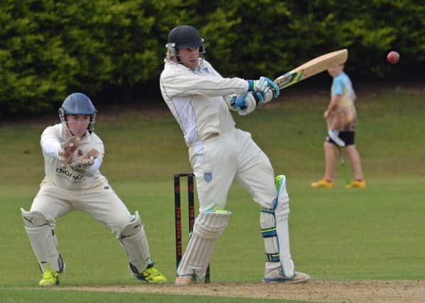 Ballymena wicketkeeper James McClean waits for any slip from Carrickfergus batsman Jamie Holmes during Saturday's NCU Premier League match at Middle Road. INCT 27-012-PSB