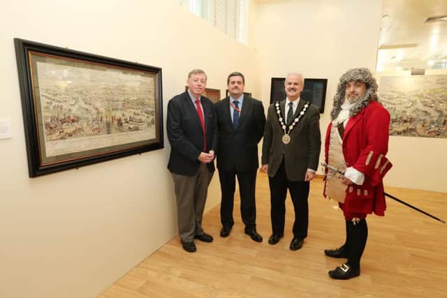 Pictured at 'The Boyne' Exhibition in the Lisburn Museum are: (l-r) Alderman Paul Porter, Chairman of the Council's Leisure & Community Development Committee;  Dr Jonathan Mattison; the Mayor, Councillor Thomas Beckett; and Philip Simpson dressed as King William.