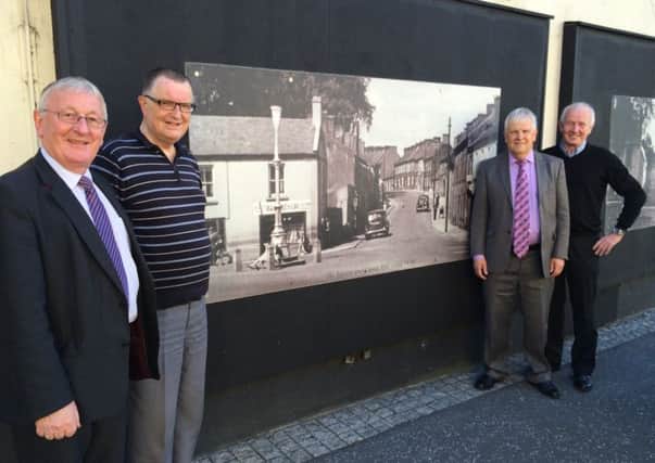 Sydney Anderson MLA with Gilford Concerned Residents Group members Harold Massey, Timothy Mayes and Owen Barry at the repaired murals.