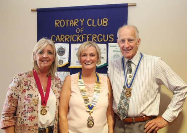 Brenda Houston (centre), president of Carrickfergus Rotary Club, with Kim Lindsay, treasurer and Colin de Fleury, secretary.  INCT 27-759-CON