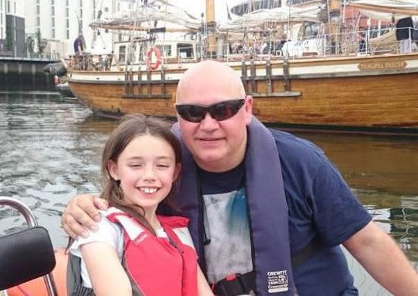 Captain (SCC) Richard Hoey RMR and daughter Alana enjoying the festival.  INCT 28-725-CON