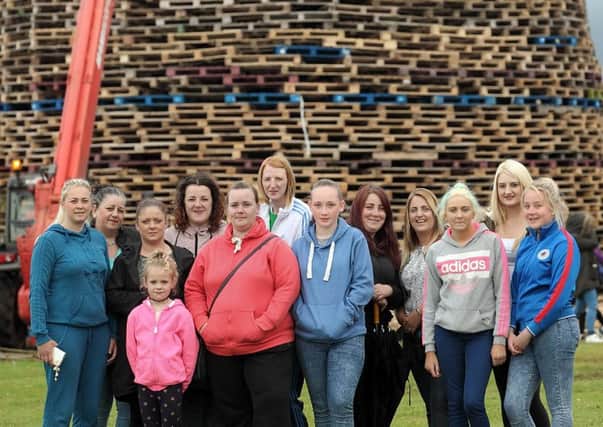 Some of the ladies who helped to rebuild the bonfire at Old Warren after the first one was set alight. US1527-568cd  Picture: Cliff Donaldson