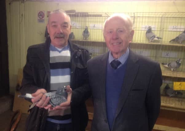 The late Tom Cotter (left) pictured at Ballymena with President Billy Smyth.