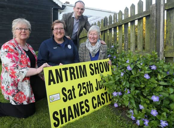 Chairman of Antrim Floral Group Marretta Coleman, Lesley Kirkpatrick of Tesco and Floral Art steward Ross McGookin joined by Home Industries Director David Crawford at the launch of Antrim Show at Shane's Castle. INAT 25-306JC