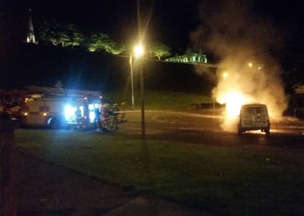 A pizza delivery van on fire at Fahan Street in the Bogside on Monday. Five children were arrested after trouble flared again in the city on Tuesday night. (Photo: Darren McGilloway)