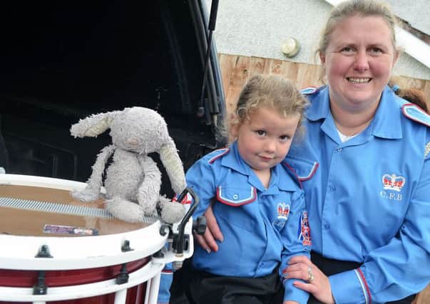 Beth and mum Diane Ferguson from Carnlough Flute Band hope "Bunny" will walk the Braid route. INBT 30-804H