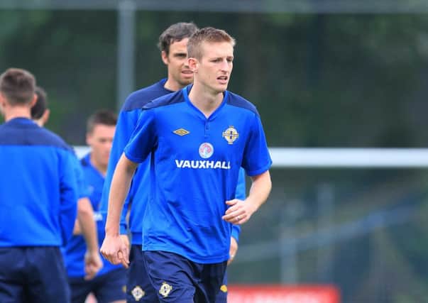 Jeff Hughes, seen here training for Northern Ireland, has signed for Cambridge United. Photo: Presseye