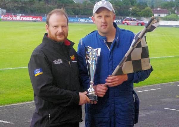 Johny Gillespie collects the GP2 Challenge Cup from Derek Fullerton.