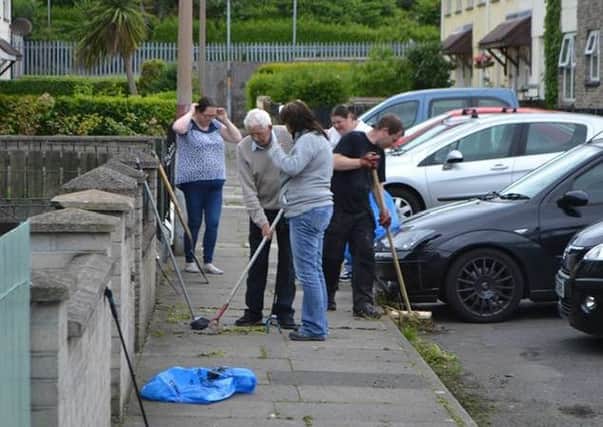 Residents from the Davys Street area took part in a community clean up on July 18.  INCT 29-725-CON