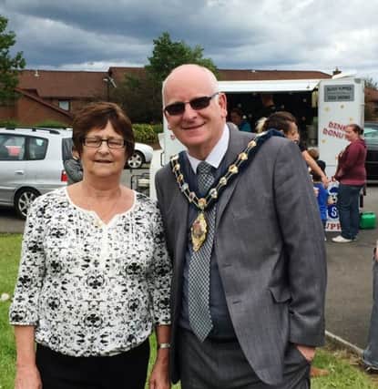 The Mayor of the Mid and East Antrim Borough Council, Councillor Billy Ashe, with Joan Caldwell of the Knockagh School of Dancing. INCT 29-755-CON