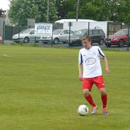 Lee Bailie in action for County Down during a Milk Cup warm-up match.