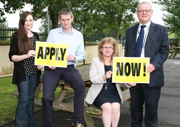 Housing Executive staff invite Mid Ulster groups to apply for funding