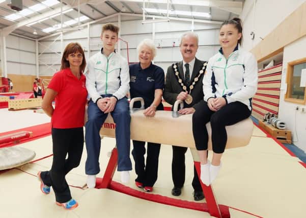 Wishing Lisburn gymnasts Casey Jo Bell and Ewan McAteer all the very best of luck as they set off to the European Youth Olympic Festival in Georgia are (l-r) Mandy McMaster, Salto Gymnastics; Ewan McAteer; Dame Mary Peters DBE CH;  Councillor Thomas Beckett, Mayor of Lisburn & Castlereagh and Casey Jo Bell. Pic by Kelvin Boyes / Press Eye