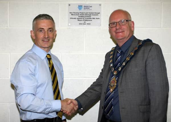 Davy Toney, of The Dojo, pictured with Mayor of Mid and East Antrim Council, Cllr. Billy Ashe, who officially opened their premises at Woodside Industrial Estate. INBT27-219AC