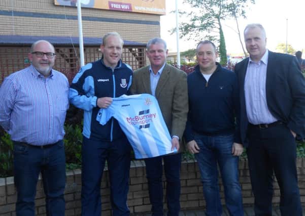 Ballymena United goalkeeper Dwayne Nelson pictured with Rangers legend Ian Durrant and club officials at the the launch of the Ballymena v Rangers XI game.