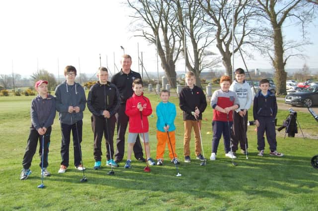 PGA Professional Dougie Bell along with Junior Golfers at Down Royal.